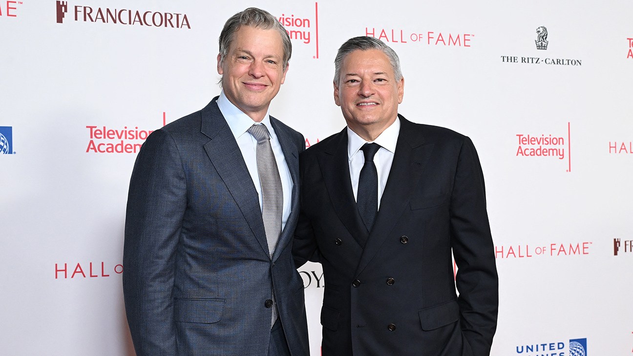 Netflix co-CEOs Ted Sarandos and Greg Peters at an industry event in Los Angeles